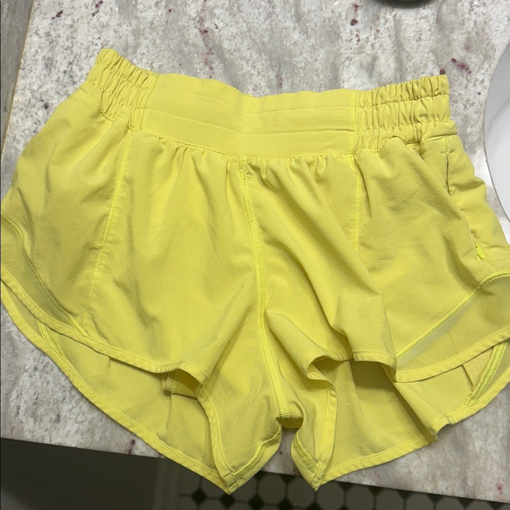 Lululemon high-rise Hottie Hot shorts in neon yellow 4